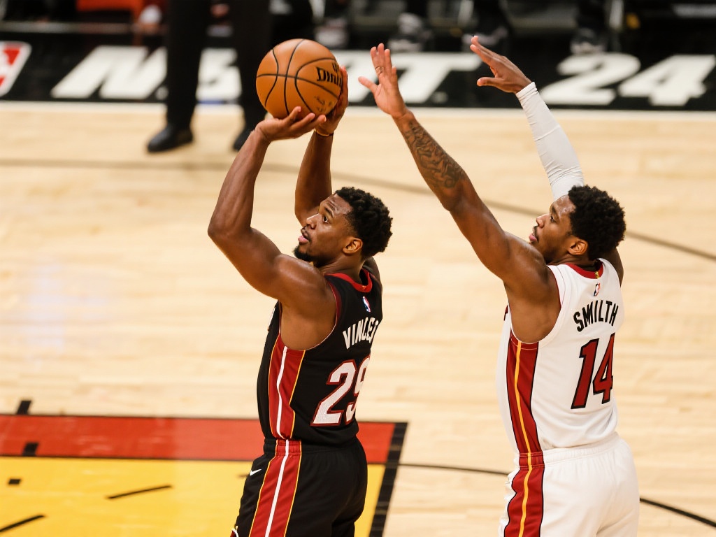 文森特与史密斯三分火力惊人24中12,队友手感冰凉仅18.2% 在比赛中,文森特和史密斯展现了极高的投射